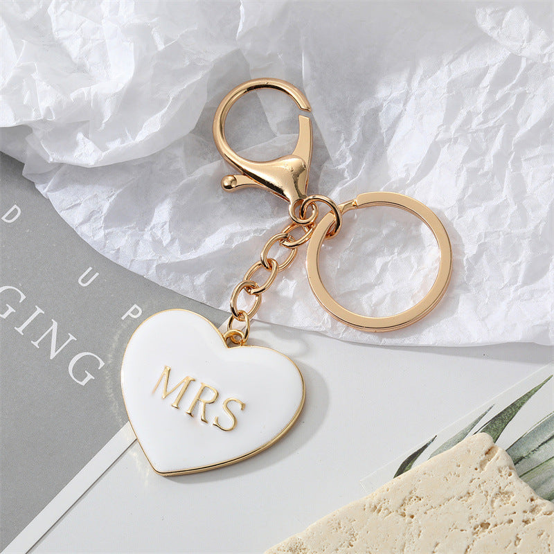Wholesale Alloy Black and White Peach Heart Drip Oil Letter MrMrs Keychains